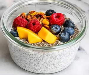 Kefir Chia Pudding Recipe 7 kefir chia pudding topping step e1752978313919 300x253 1